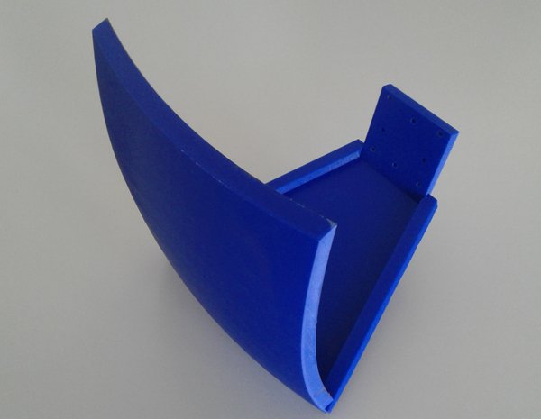 The picture is showing a blue part printed by a 3D printer.