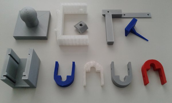 The picture is showing parts printed by a 3D printer.