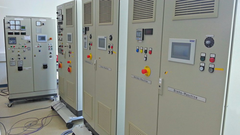 A picture showing four generator cabins