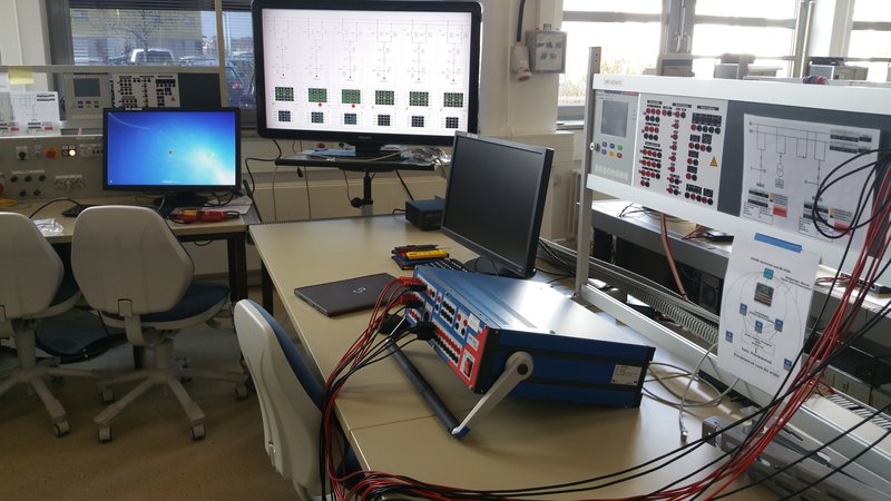 A picture of a laboratory equipped with electrical devices and monitors